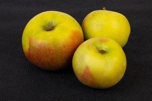 Ripe apples over background photo