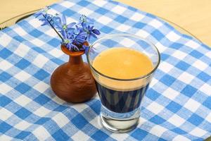 Espresso with spring flower photo