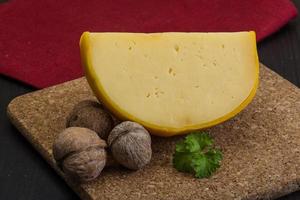 Yellow round cheese photo