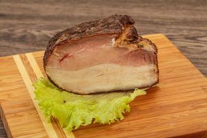 Homemade Smoked pork peat with spices photo