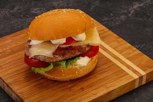 Delicous burger with tuna fish photo