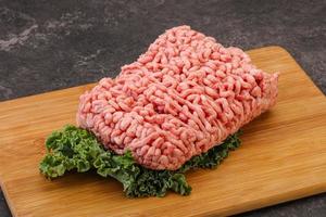 Raw pork minced meat for cooking photo