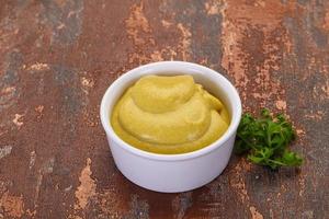 Mustard sauce in the bowl photo