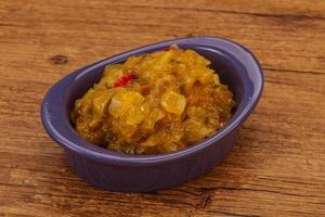 Relish sauce with cucumbers and mustard photo