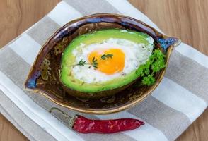 Egg backed in avocado photo