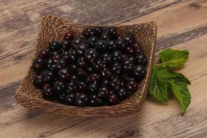 Fresh ripe sweet black currant photo