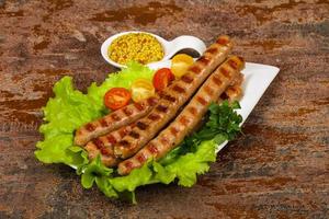 Grilled pork sausages photo