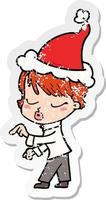 distressed sticker cartoon of a woman with eyes shut wearing santa hat vector