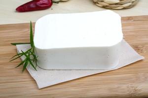 Feta cheese on wood photo