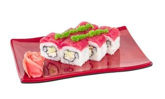 Maki Sushi - Roll made of Crab, avocado, cucumber inside. Fresh Tuna and tobico roe outside photo