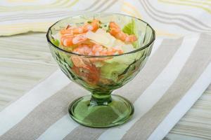 Caesar salad with shrimps photo