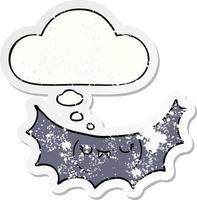 cartoon vampire bat and thought bubble as a distressed worn sticker vector