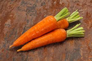 Three Young fresh ripe carrot photo