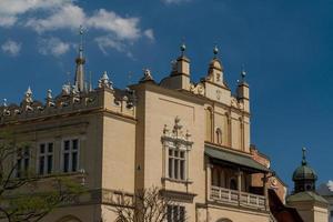 Sukiennice building in Krakow in strange perspective, Poland photo
