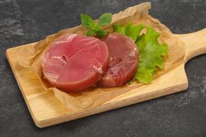 Raw tuna round steak for grill photo