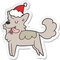 sticker cartoon of a happy dog wearing santa hat vector