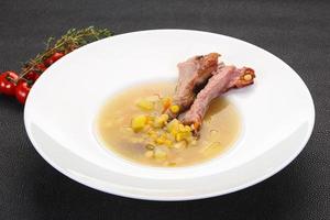 Peas soup with ribs photo