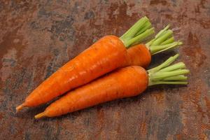 Three Young fresh ripe carrot photo