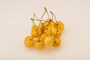 Sweet ripe yellow cherry heap photo