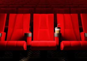 Rows of red velvet seats watching movies in the cinema with copy space banner background. Entertainment and Theater concept. 3D illustration rendering photo