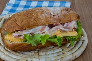 Ciabatta with cheese and bacon photo