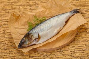 Salted herring over the wooden board photo