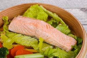 Steamed salmon with vegetables photo