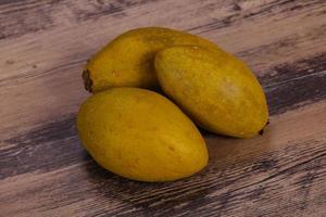 Exotic tropical fruit - Sapodilla in the plate photo