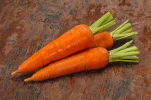 Three Young fresh ripe carrot photo