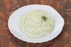 Cottage cream snack with herbs photo