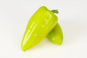 Sweet green bell pepper isolated on white photo