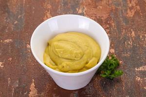 Mustard sauce in the bowl photo