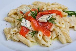 Penne with salmon photo