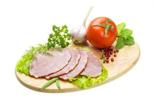 Ripe fresh ham with vegetables photo