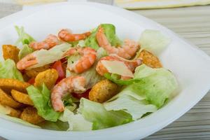 Caesar salad with shrimps photo