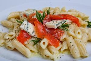 Penne with salmon photo