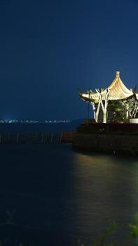 The night lake view with the lights on in the evening photo