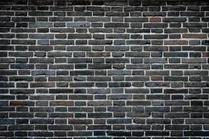 Rough Brick wall dark stone grunge texture background. photo