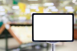 Blank price board sign display in Supermarket with fresh food abstract blurred background with bokeh light photo