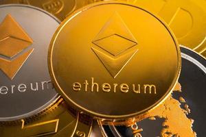 Gold ethereum or electronic worldwide exchange virtual money, blockchain, cryptocurrency online concept. photo