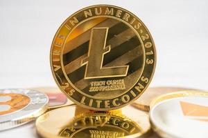 Litecoins or electronic worldwide exchange virtual money, blockchain, cryptocurrency online concept. photo