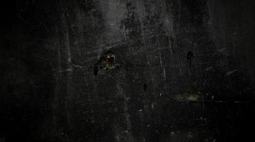 Scary dark old wall texture for the background, the wall is full of stains and scratches photo