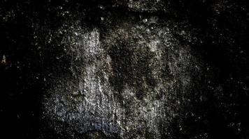 Scary dark old wall texture for the background, the wall is full of stains and scratches photo