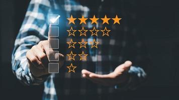 Product or service review ideas from customers, portraits pointing to a star rating button with the store used, store rating reviews to get the store's opinions and show satisfaction. photo