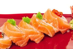 Japanese sushi traditional japanese food.Roll made of salmon, red cavair, roe and cream photo