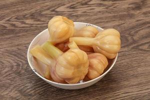 Marinated garlic in the bowl photo