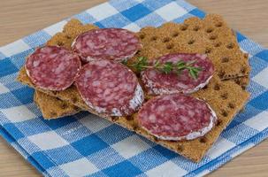 Crispbread with salami photo