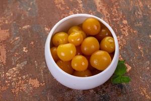 Yellow ripe cherry dessert photo