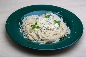 Pasta with blue cheese and basil photo