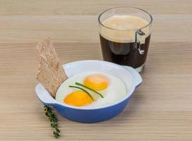 Breakfast with eggs and coffee photo